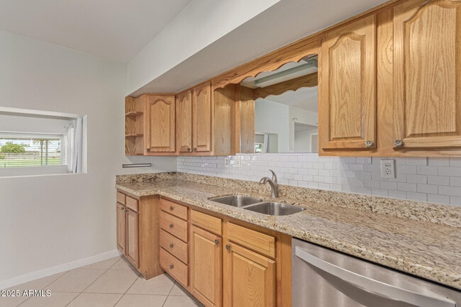 Building Photo - 12640 N Pebble Beach Dr