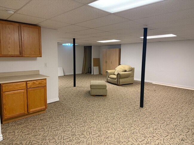 Building Photo - Large 2 Story home with 3 Bedrooms, 2.5 baths, hardwood floors, office and finished basement