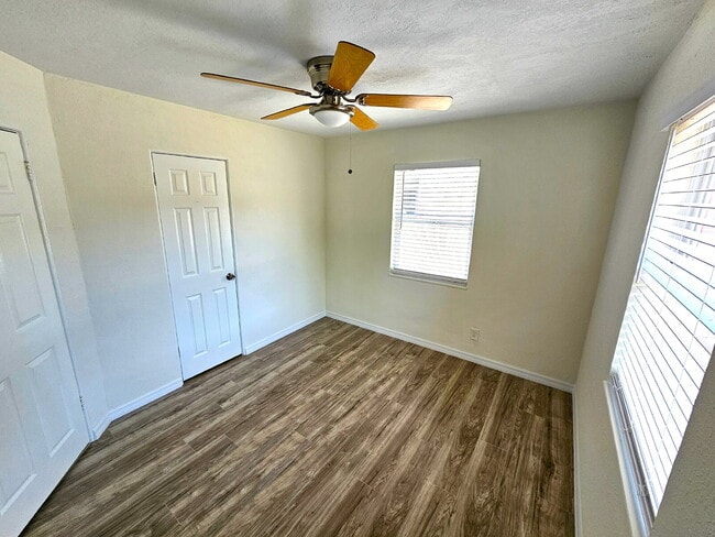 Building Photo - fully renovated 2-bedroom, 1-bathroom home with bonus guest room or office and oversized fenced yard