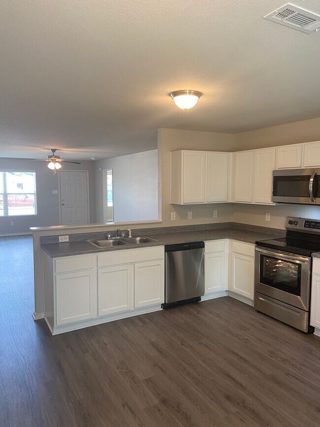 Building Photo - *PreLeasing* Four Bedroom | Two Bath Home in Conrad Court