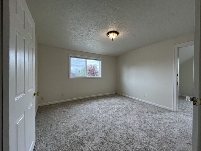 Building Photo - Character-Filled Concordia Home with Flexible Living Spaces & Gas Fireplace