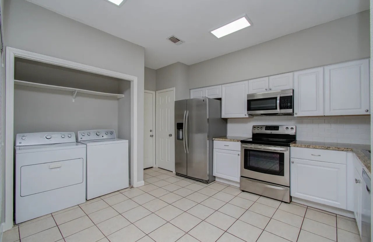 Laundry just off of kitchen - washer/dryer included - 12697 Briar Patch Rd