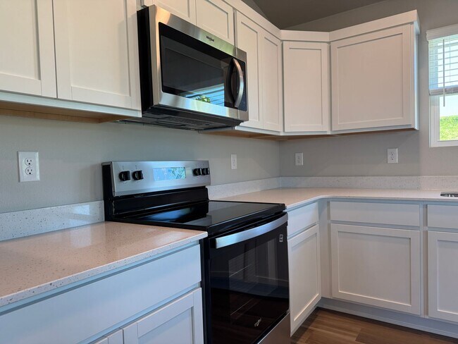 Building Photo - Spacious 4-Bedroom Split-Level Near Standing Bear Lake & Trails