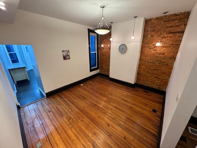 Building Photo - BEAUTIFUL, large brick row home in Hollins...