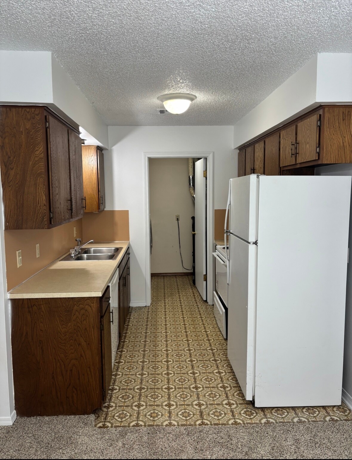 Kitchen - garbage disposal, dishwasher, stove and refrigerator - 5018 W 5th Pl