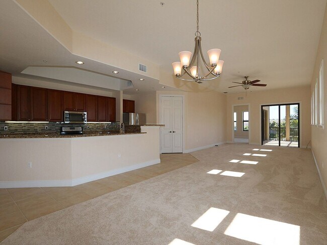 Building Photo - BEAUTIFUL 3-BEDROOM  WATERFRONT CONDO WITH BOAT SLIP AND HEATED POOL