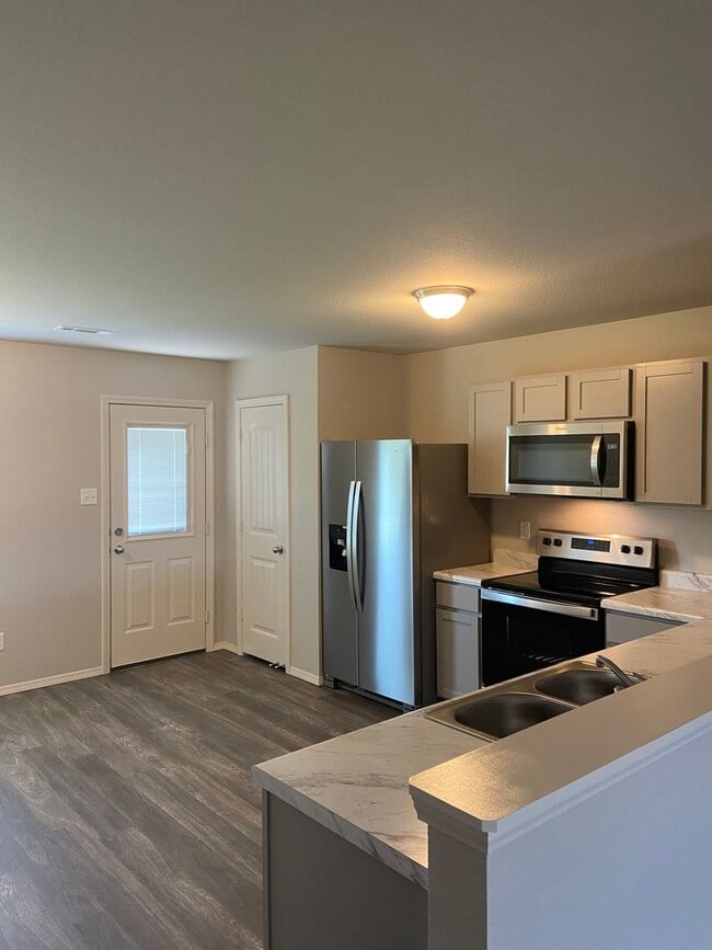 Building Photo - Big Space, Bigger Savings — 4-Bedroom Conrad Court Home with $99 First Month’s Rent