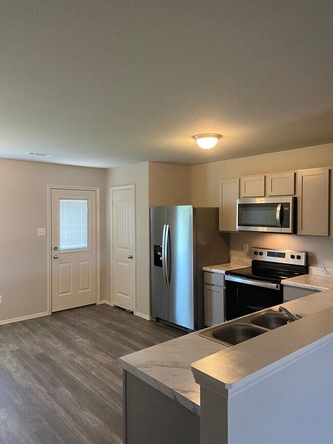 Building Photo - Comfort & Space in Conrad Court — 4-Bed, 2-Bath Home Available Now