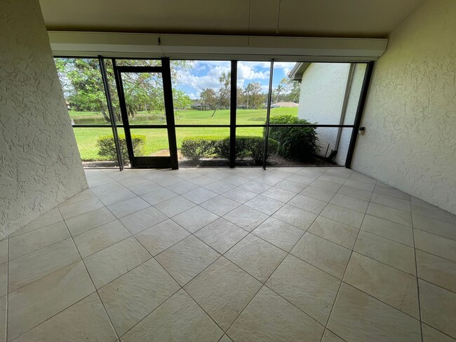 Building Photo - ANNUAL RENTAL - 2 + DEN / 2 BATH VILLA AT ...