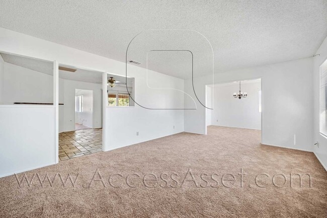 Building Photo - Single-Story 3 Bed with Covered Patio & Gated Yard