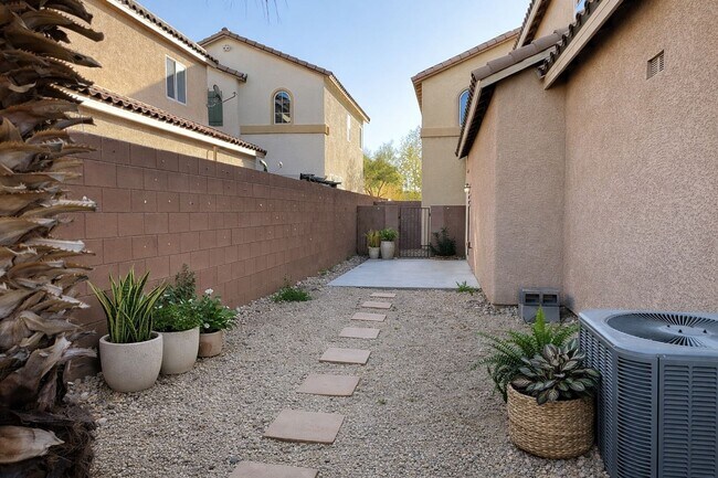 Building Photo - Modern 3-BDR Home in Gated Las Vegas Community | Solar Panels | EV-Ready Garage