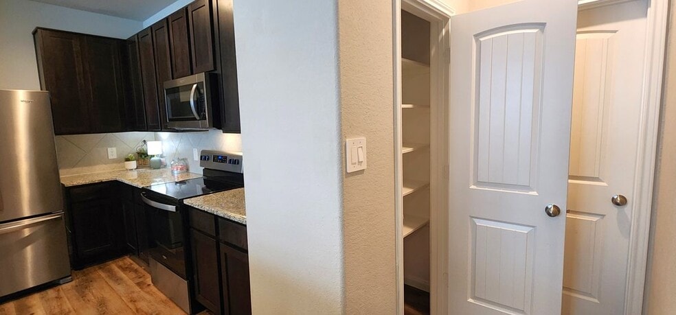 Building Photo - 5759 Cerrillos Dr