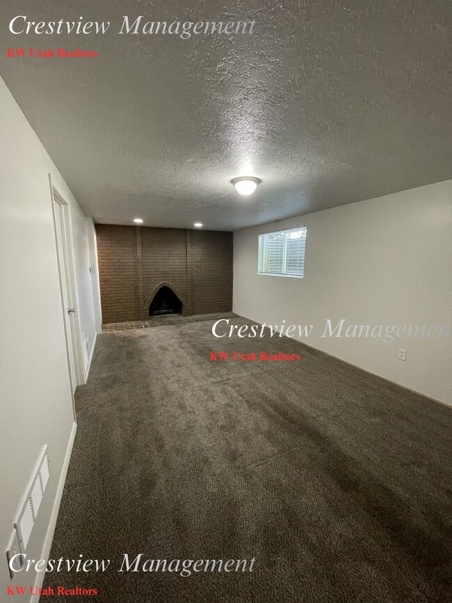 Building Photo - Charming 4-Bedroom Home in West Valley City – Spacious & Convenient Location- 1st month's rent Free!