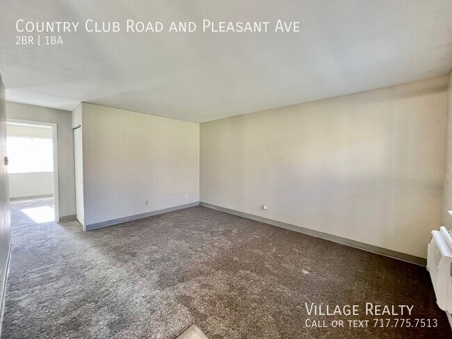 Building Photo - 605 Country Club Rd