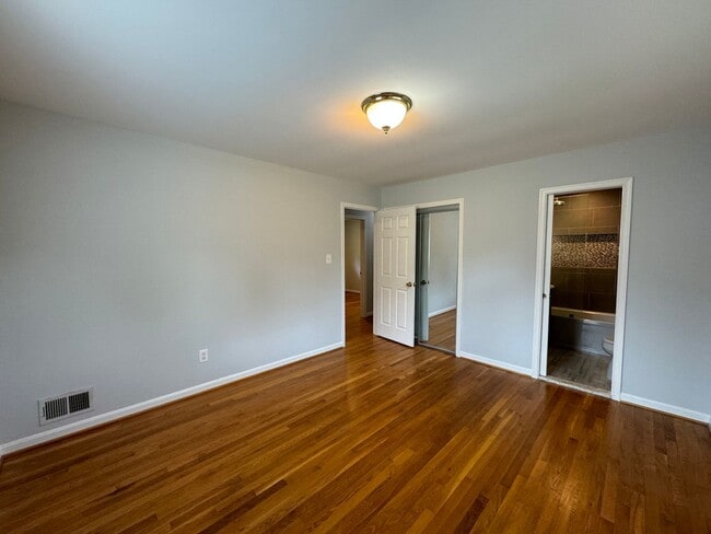 Building Photo - Sought-After 4 Bed 3 Bath L-Shaped Rambler...