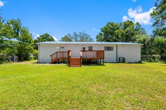 Building Photo - 6847 Woodsman Dr