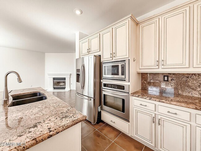 Building Photo - Beautiful Light and Bright Dos Vientos Home featuring 4 Bedrooms + 3 Bathrooms