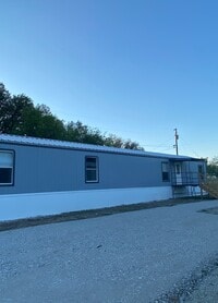 Building Photo - Early Bird Estates Unit #16