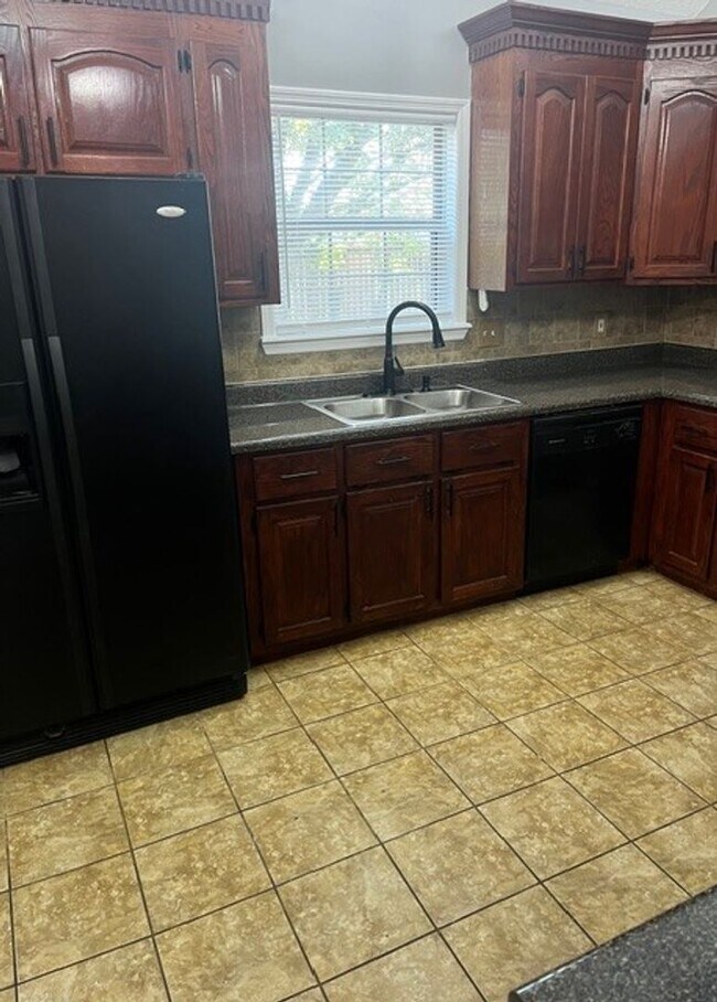 Building Photo - Charming All-Brick Corner Lot Home with Hot Tub & Fenced Yard