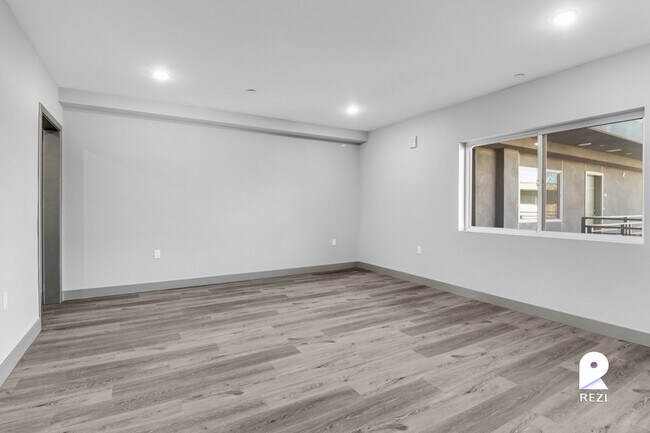 Building Photo - 7040 Woodman Ave