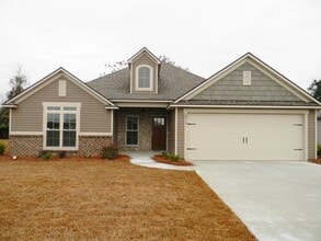 Building Photo - Modern 4BR Home with Open Layout, Granite Counters & Community Pool Access