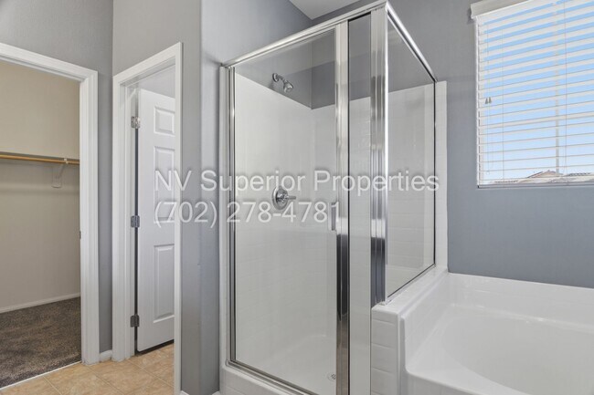 Building Photo - NW!! 4 Bedrooms!!! One Bedroom Down!!  Pool!!! Tankless Hot Water Heater!! Court yard at entrance...