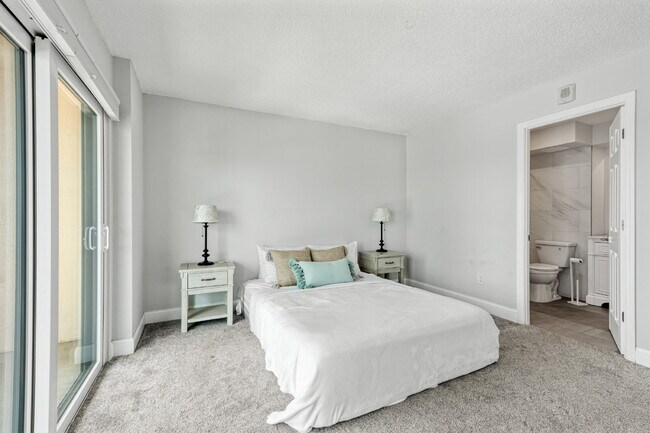 Building Photo - NEWLY RENOVATED TWO BEDROOM CONDO IN WATERFRONT RESORT STYLE COMMUNITY