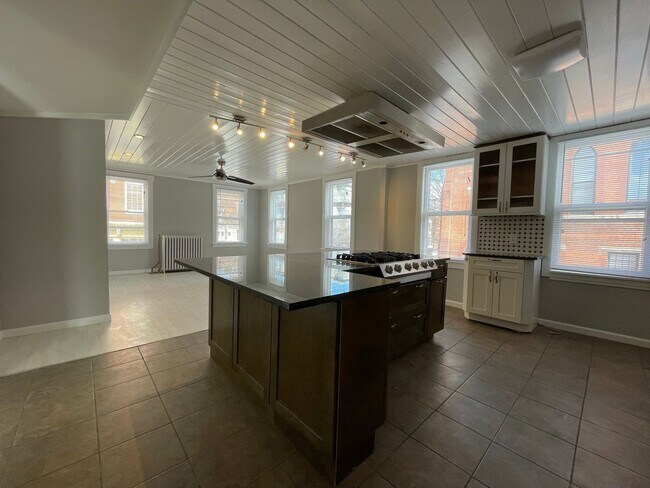 Building Photo - Small pets are welcome with an additional ...