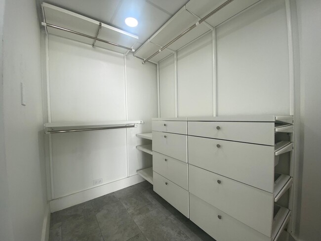Building Photo - Live in Luxury and Convenience in the Hear...