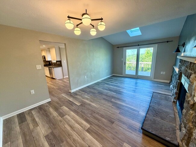 Building Photo - Modern Comforts Await: Spacious Rental with 2-Car Garage, Private Office, and Finished Basement w...