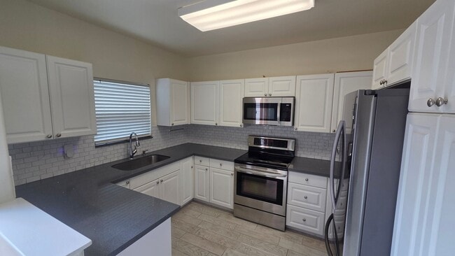 Building Photo - Must See This Beautiful 3/2.5 Townhome "Ke Noho Kai" at Ocean Pointe.