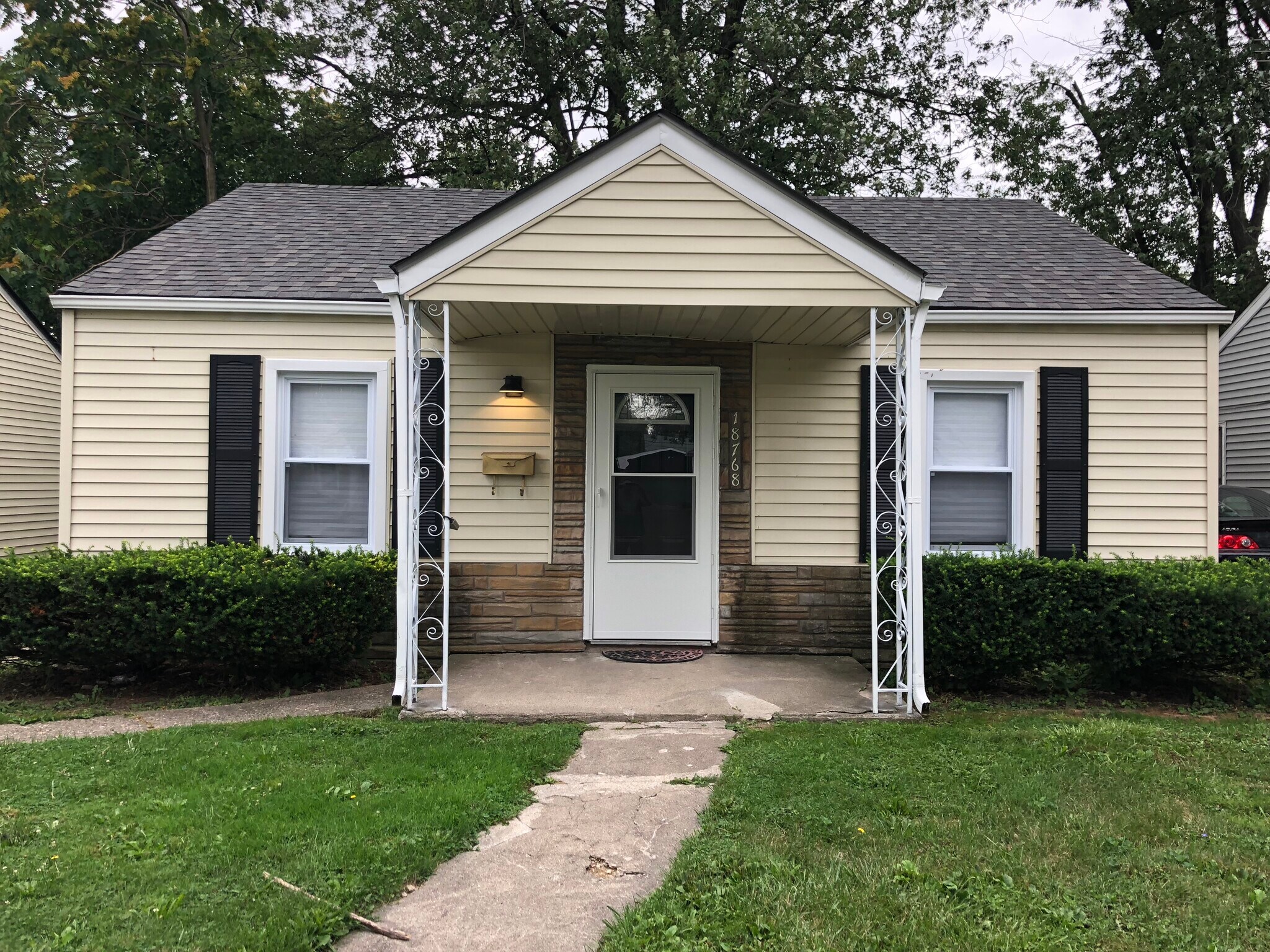 Features a large shaded backyard - 18768 Roscommon St