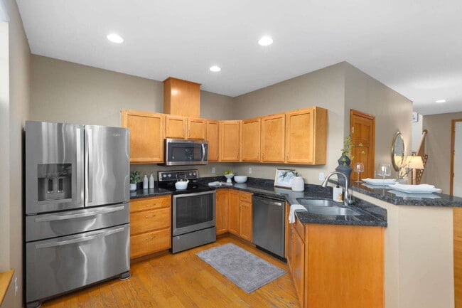 Building Photo - 1/2 OFF FIRST MONTHS RENT IF LEASE SIGNED BY 9/15!! Beautiful End-Unit Townhome in Highland Parc ...