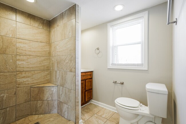 Building Photo - Charming 4-Bedroom Home with Spacious Lawn