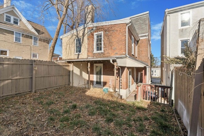 Building Photo - Stylish Phoenixville Rowhome with Exposed Brick, High Ceilings & Central Air