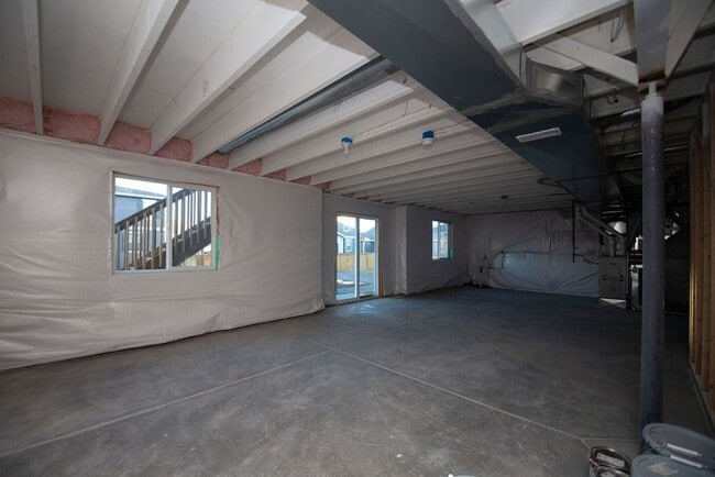 Building Photo - Spacious 4-Bedroom Home with 3-Car Garage & Walk-Out Basement | Prime Living Opportunity