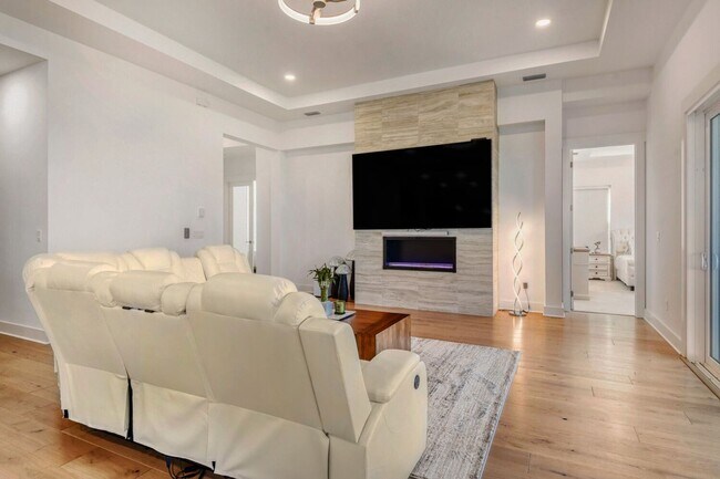 Building Photo - Resort-Style Furnished Lakefront Living in SilverLeaf | 100” Theater & Golf Cart Included