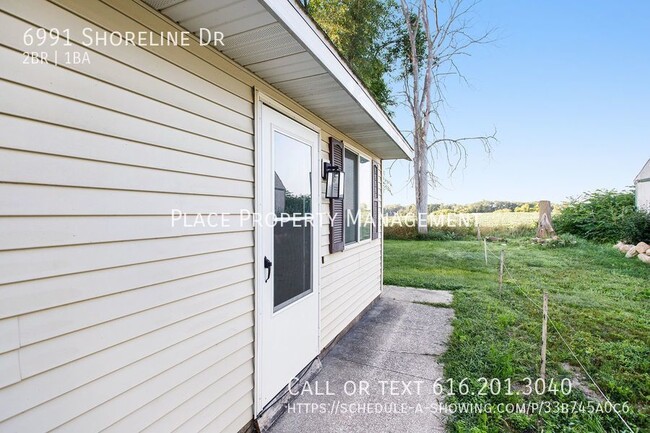 Building Photo - 6991 Shoreline Dr
