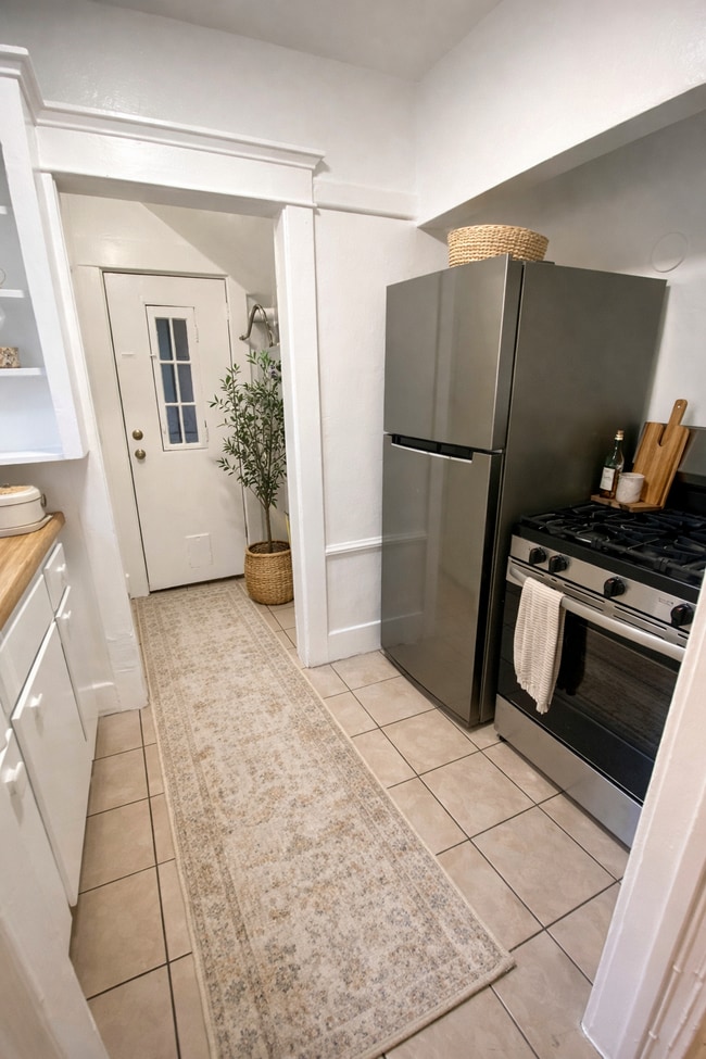 Kitchen with new Fridge and Stove - 7270 1/2 Fountain Ave
