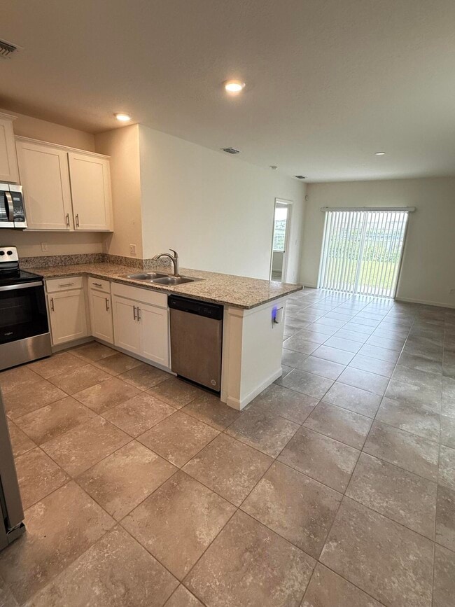 Building Photo - 10997 SW Vasari Way