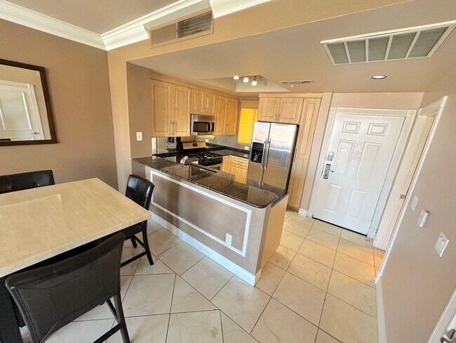 Building Photo - Beautiful, partially furnished 1 bedroom w...