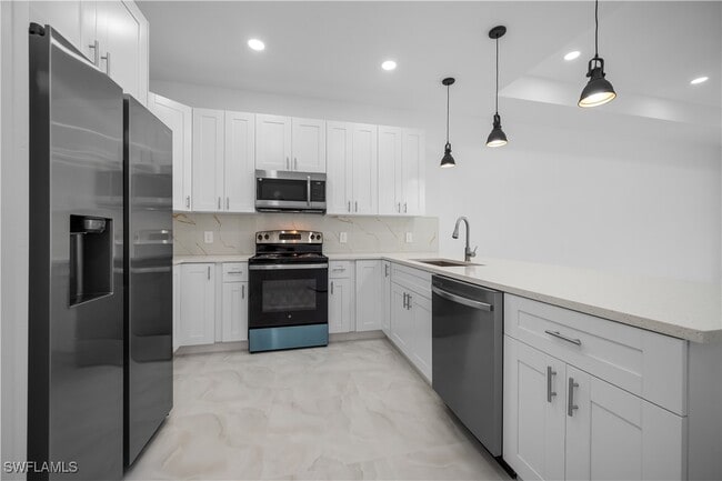 Building Photo - 2400 Wanda Ave N