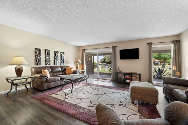 Building Photo - This beautifully appointed 3-bedroom, 2-bathroom condo seasonal rental Located in Leisure World A...