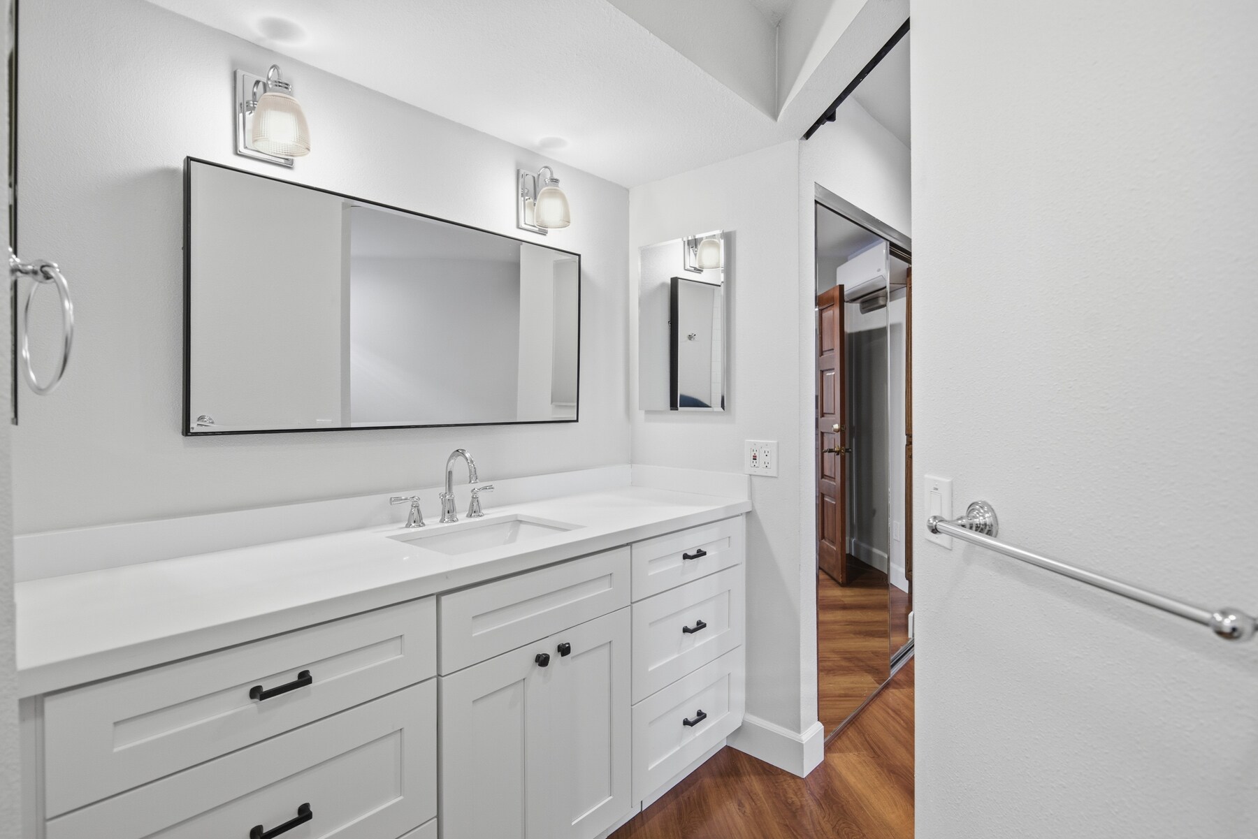 Suite #2 has large vanity with mirror and 2 medicine cabinets - 369 Palm Ave