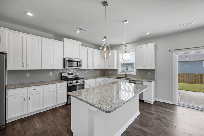 Building Photo - Sophisticated Like-New 4-Bedroom Home with Designer Finishes & Fenced Backyard!