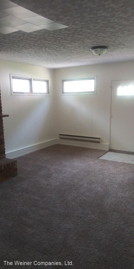 Building Photo - 4 br, 3 bath House - 505 E. Elm St.