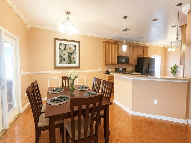 Building Photo - Spacious 4BR w/ Fenced Yard + Covered Lanai + 2 Car Garage  in Orange Park!