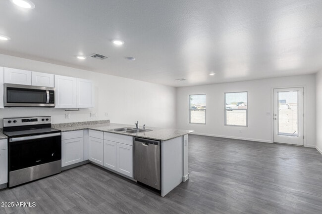 Building Photo - 9930 W Carousel Dr