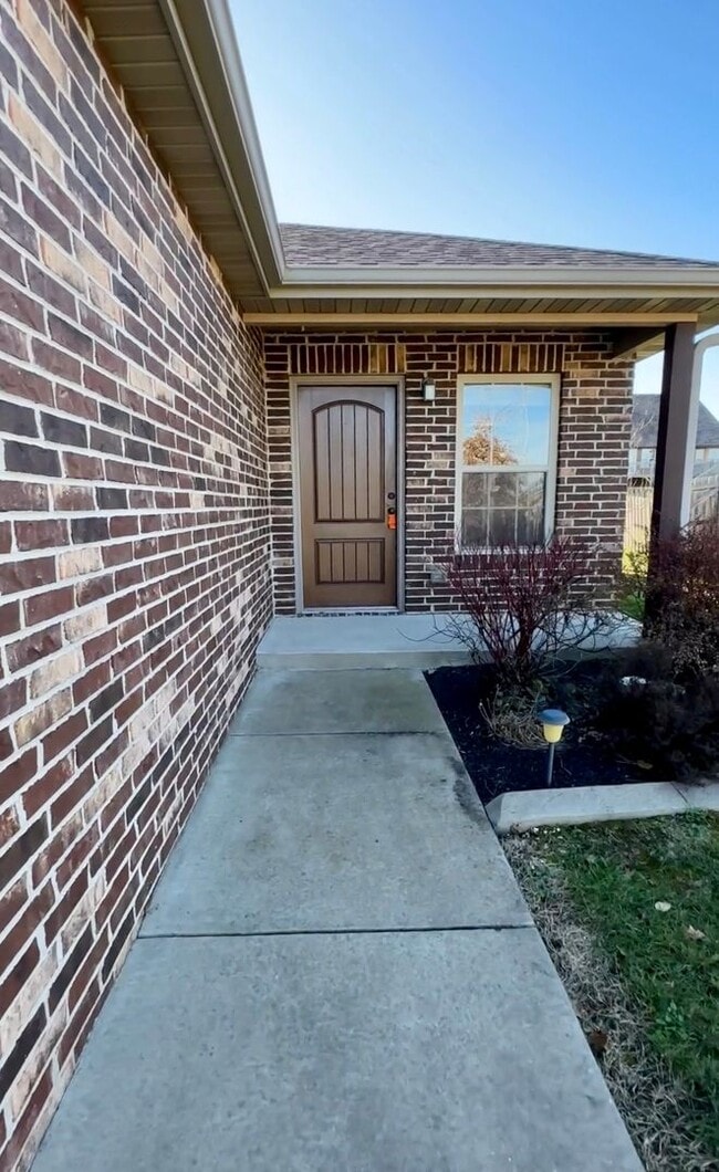 Building Photo - This Gorgeous All Brick and Stone Patio Ho...