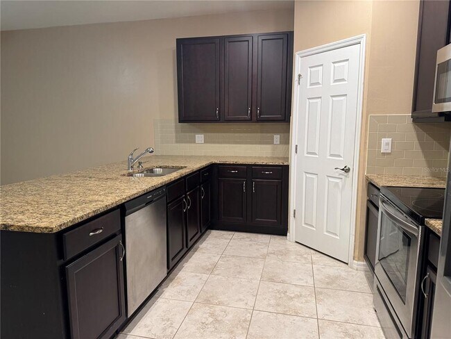 Building Photo - 26077 Sandhill Blvd